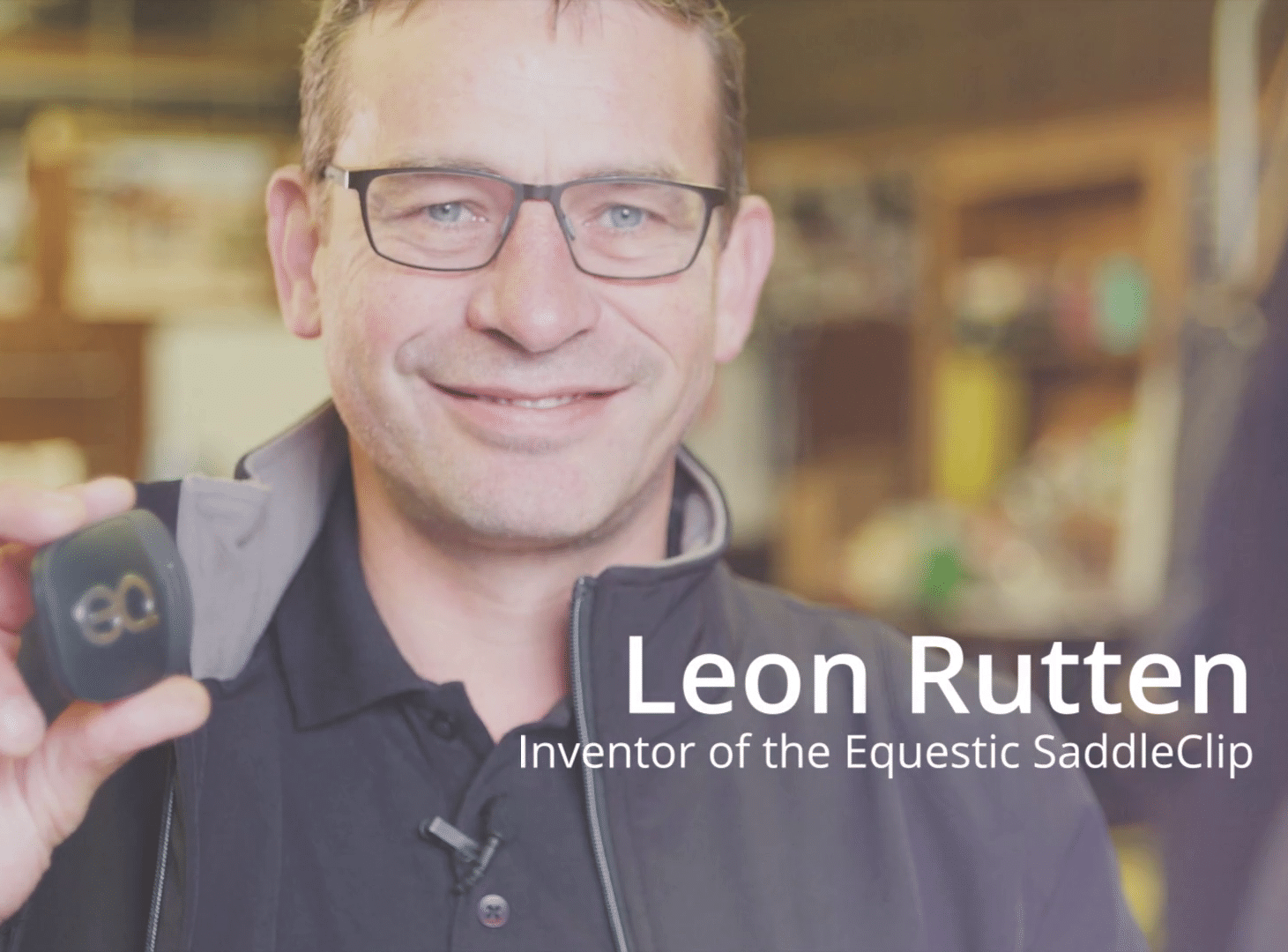 Leon Rutten, founder of Equestic and inventor of the SaddleClip, pictured during a presentation showcasing the technology's role in data-driven horse training.